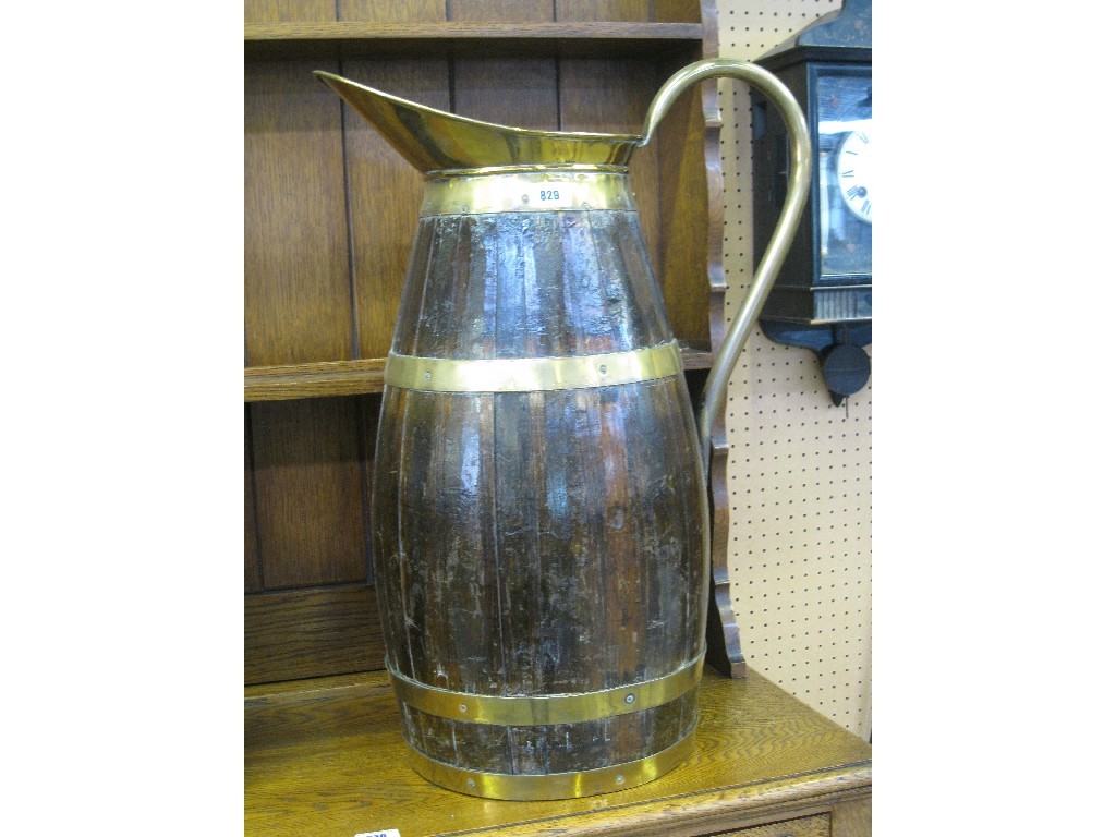 Appraisal: Oak and brass bound stickstand in the shape of a