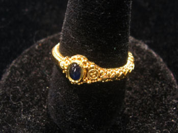 Appraisal: karat yellow gold and sapphire petite band ring Petite sapphire