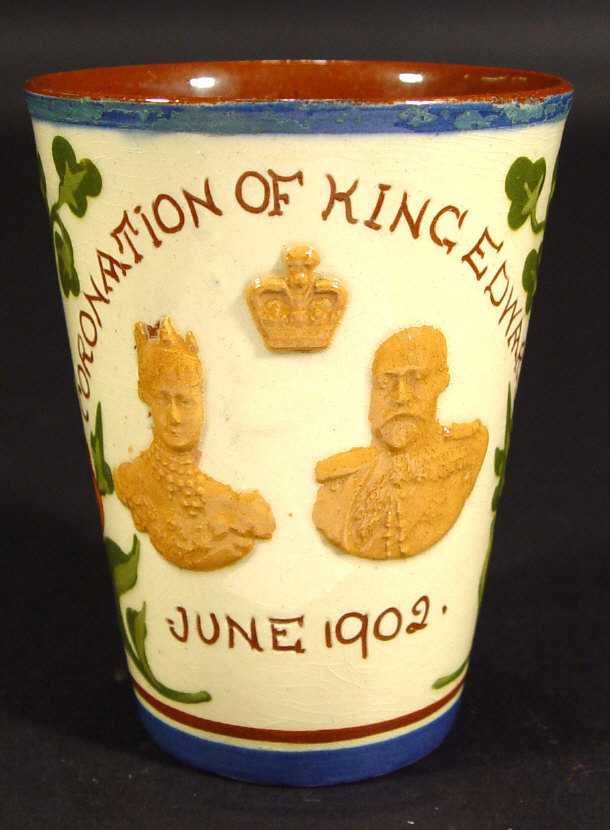 Appraisal: Watcombe Torquay commemorative beaker relief moulded with portraits of King