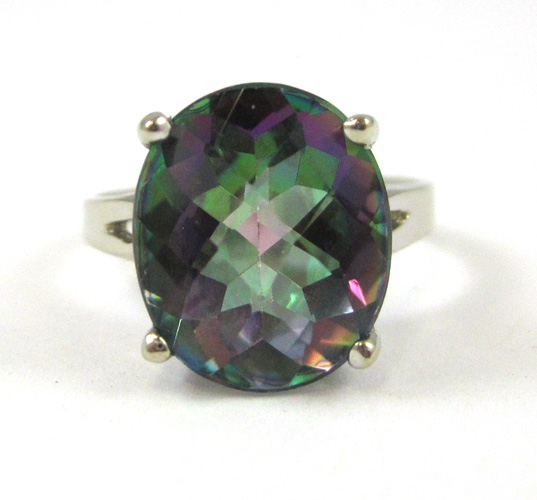 Appraisal: MYSTIC TOPAZ AND FOURTEEN KARAT GOLD RING The white gold