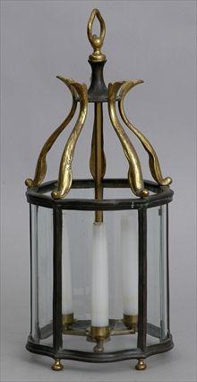 Appraisal: GEORGIAN-STYLE GILT-METAL AND BRONZE THREE-LIGHT SMALL HALL LANTERN The waved