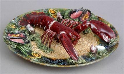 Appraisal: MAJOLICA LOBSTER PLATE Realistically modeled with the lobster on sandy