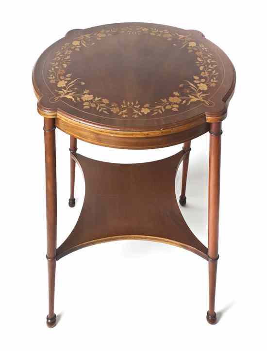 Appraisal: A Continental Marquetry Occasional Table having two shaped graduated tiers