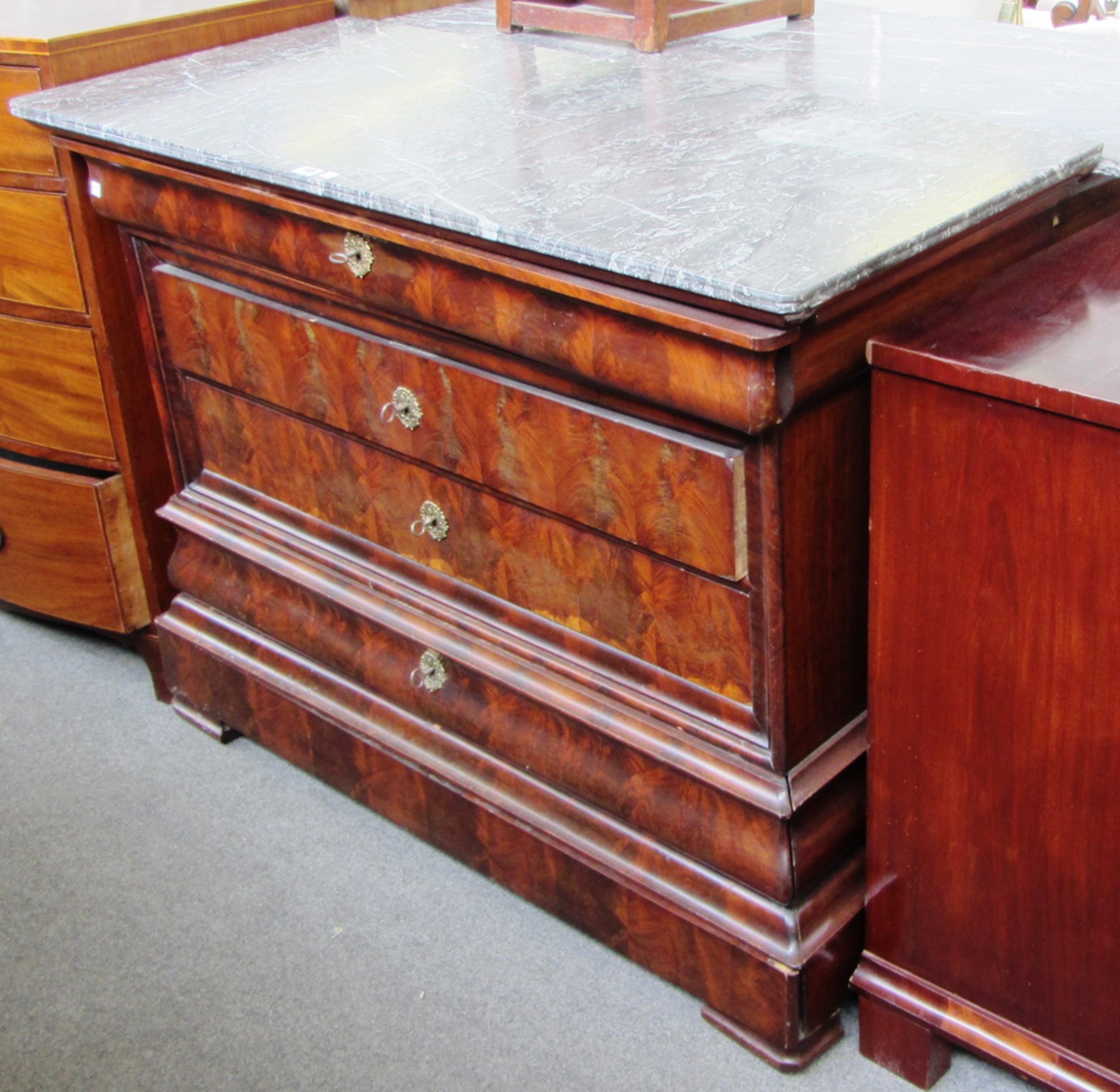 Appraisal: A th century French commode the marble top over a