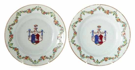 Appraisal: Pair Chinese Export armorial soup plates circa floral-garland wide rim