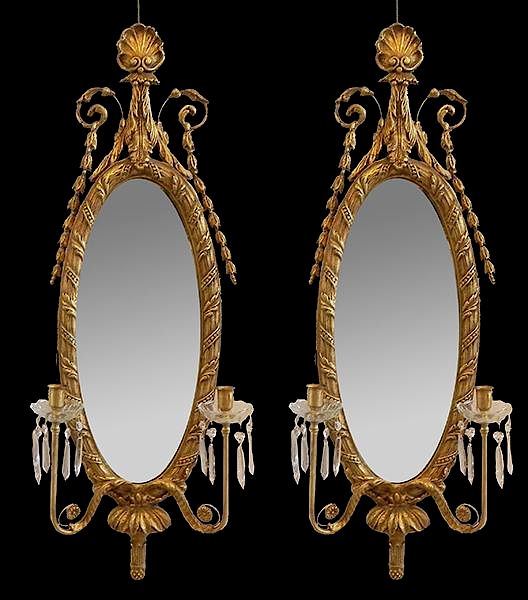 Appraisal: Pair of Gilt Mirrors Pair of Adams style gilt mirrors