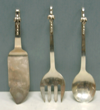 Appraisal: THREE-PIECE MEXICAN SILVER SERVING FLATWARE comprising a two-piece salad set