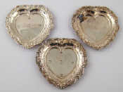 Appraisal: Three silver heart shape dishes Queen's Silver Jubilee London hallmark