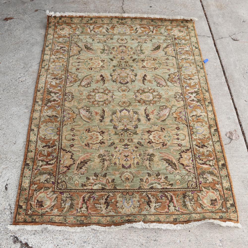 Appraisal: INDIA AGRA OLIVE AND ECRU WOOL ESTATE CARPET RUG S