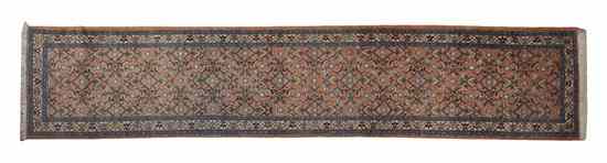 Appraisal: A Persian Wool Runner having allover stylized foliate decoration on