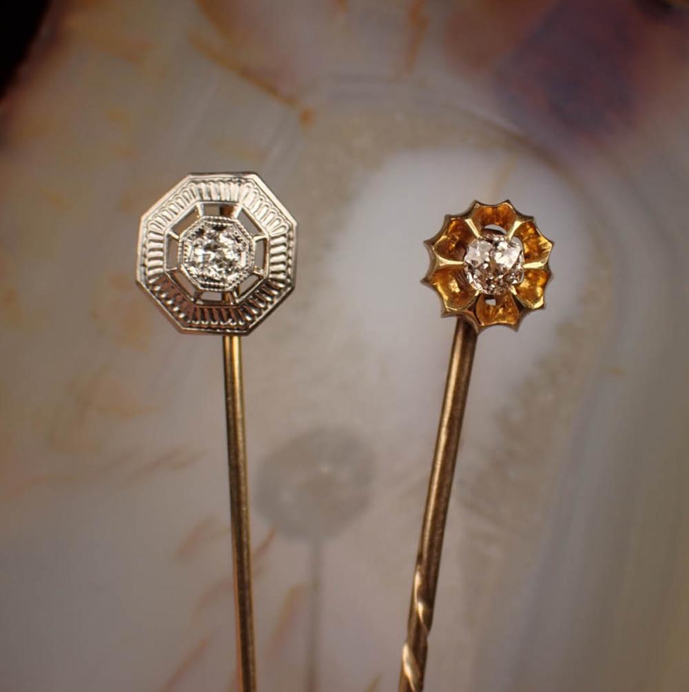 Appraisal: TWO DIAMOND AND FOURTEEN KARAT GOLD STICK PINS length k