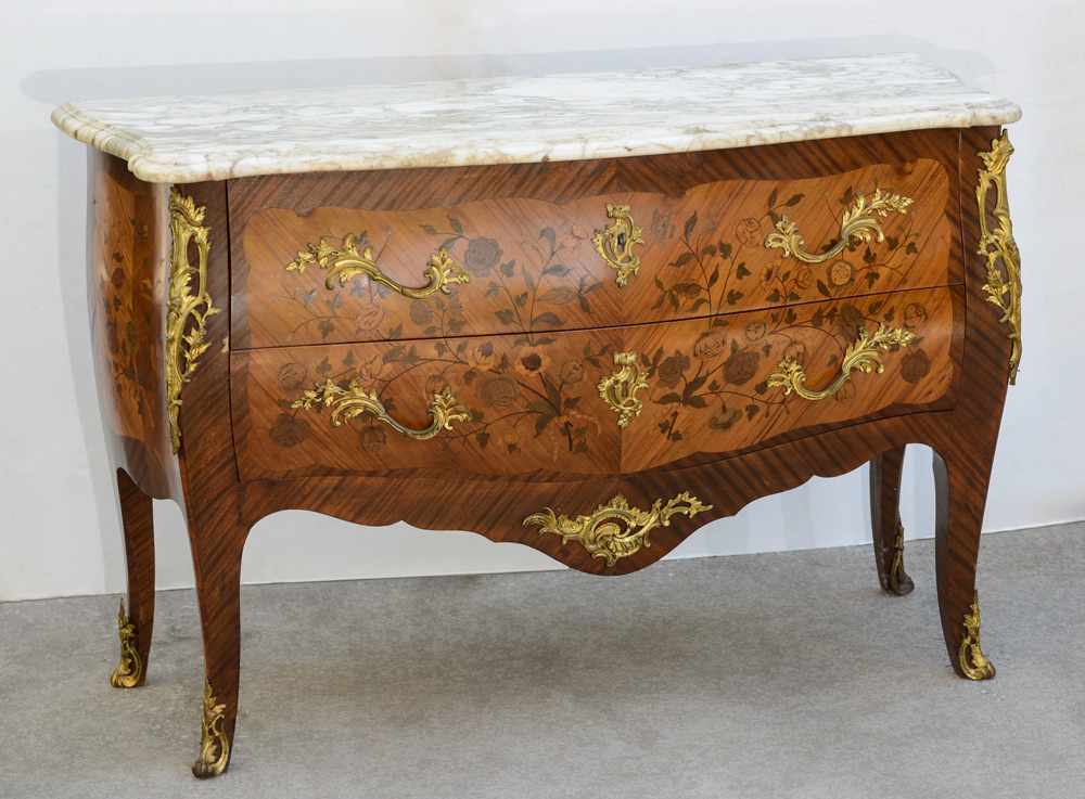 Appraisal: MARBLE TOP ORMOLU MOUNTED CHEST Shaped marble top floral marquetry