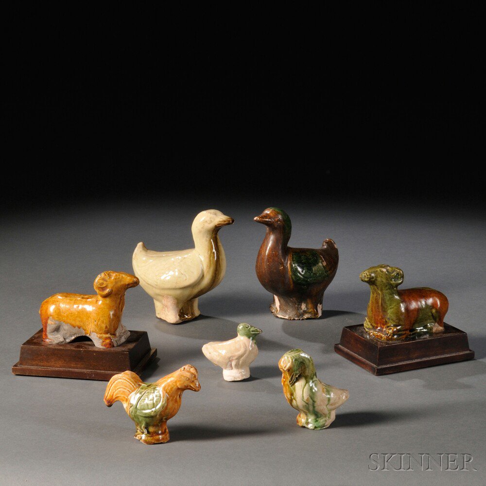 Appraisal: Seven Pottery Items China Tang Dynasty style a standing duck