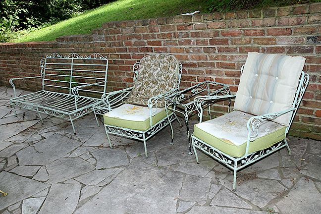 Appraisal: Iron Porch Set Lot A group of two chairs two