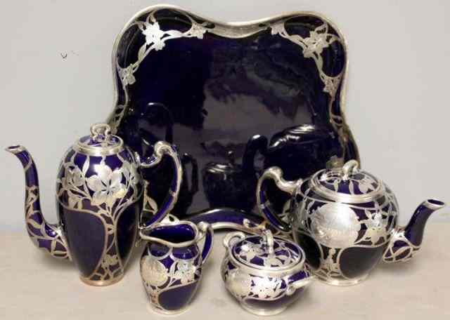 Appraisal: Art Nouveau Sterling Overlaid Blue Porcelain TeaSet No manufacturers mark