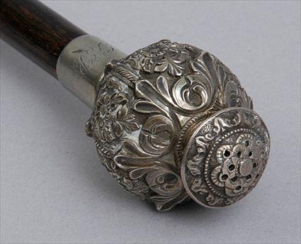 Appraisal: SILVER-HANDLED BAMBOO CANE The handle fashioned from an English repouss