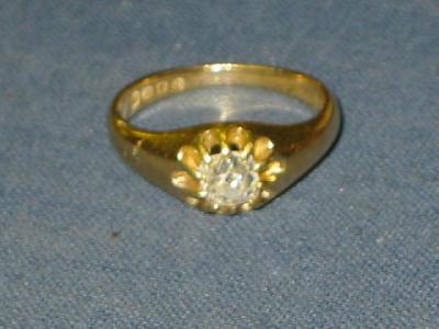 Appraisal: A SOLITAIRE DIAMOND RING the cushion cut stone approximately cts