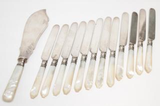 Appraisal: English Silver Mother-of-pearl and silver-plate English dinner knives bearing the