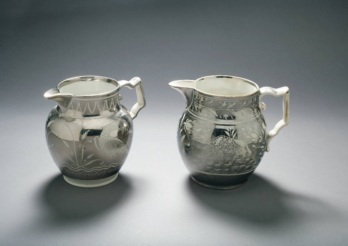 Appraisal: TWO YORKSHIRE SILVER RESIST LUSTRE JUGS CIRCA - The first