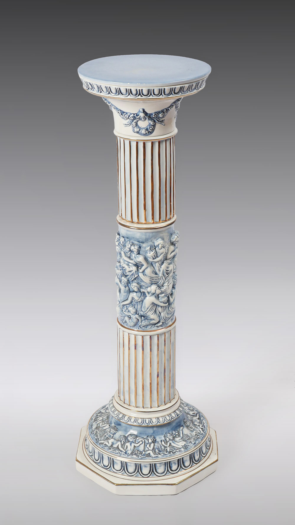 Appraisal: CAPODIMONTE PORCELAIN PEDESTAL Porcelain Capodimonte pedestal having encompassing raised figural