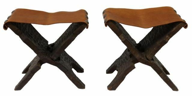 Appraisal: pair Rustic folding stools th c leather sling seat fixed