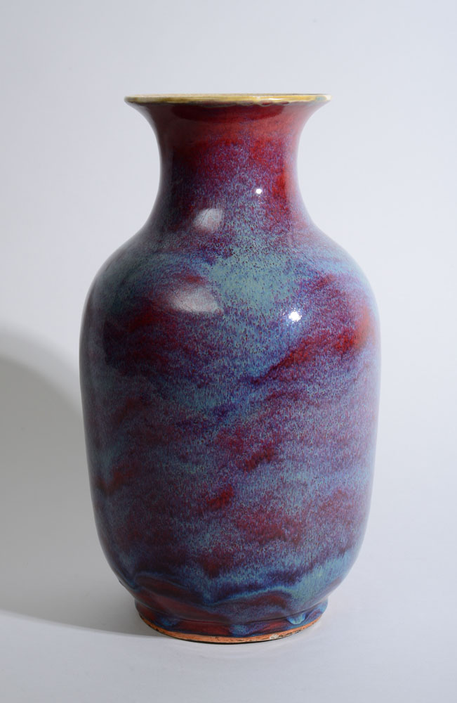 Appraisal: CHINESE FLAMB -GLAZED PORCELAIN BALUSTER-FORM VASE Unmarked with blue sprays