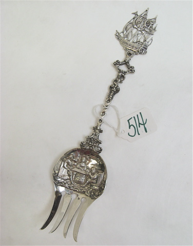 Appraisal: NETHERLANDS SILVER ORNATE ASPARAGUS SERVING FORK c having a sailing