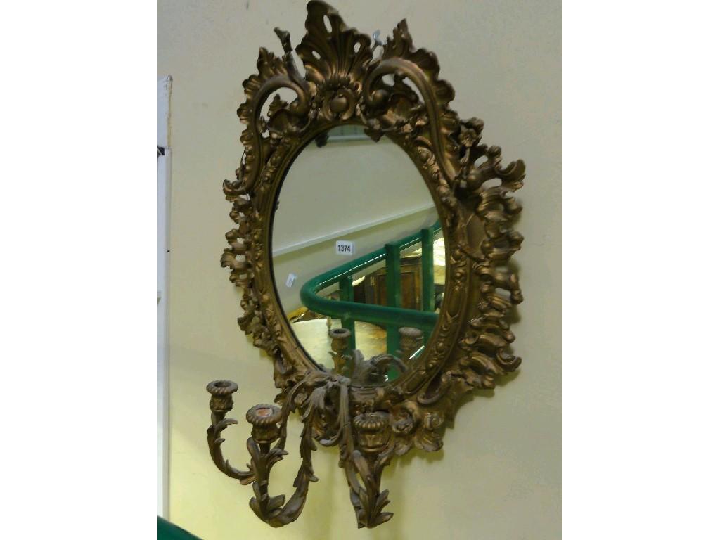 Appraisal: A th century gilt framed girandole with scrolling acanthus and