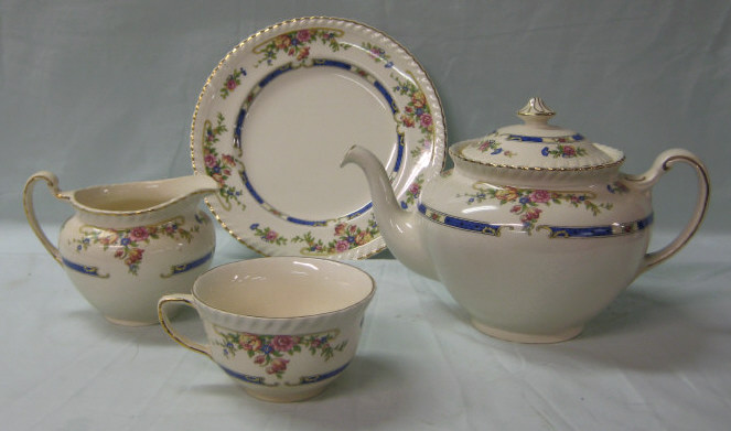 Appraisal: JOHNSON BROTHERS STAFFORDSHIRE POTTERIES Old English dinner service with serving