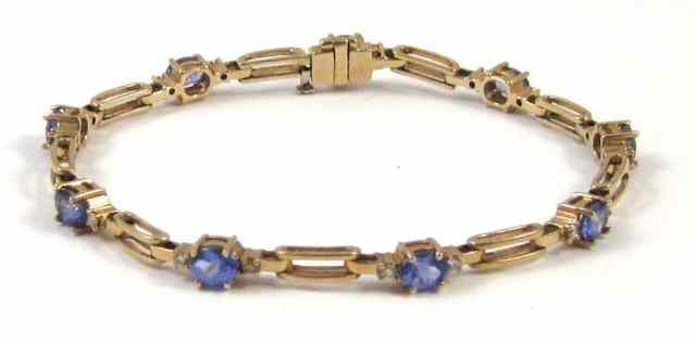 Appraisal: TANZANITE AND DIAMOND BRACELET k yellow gold set with nine