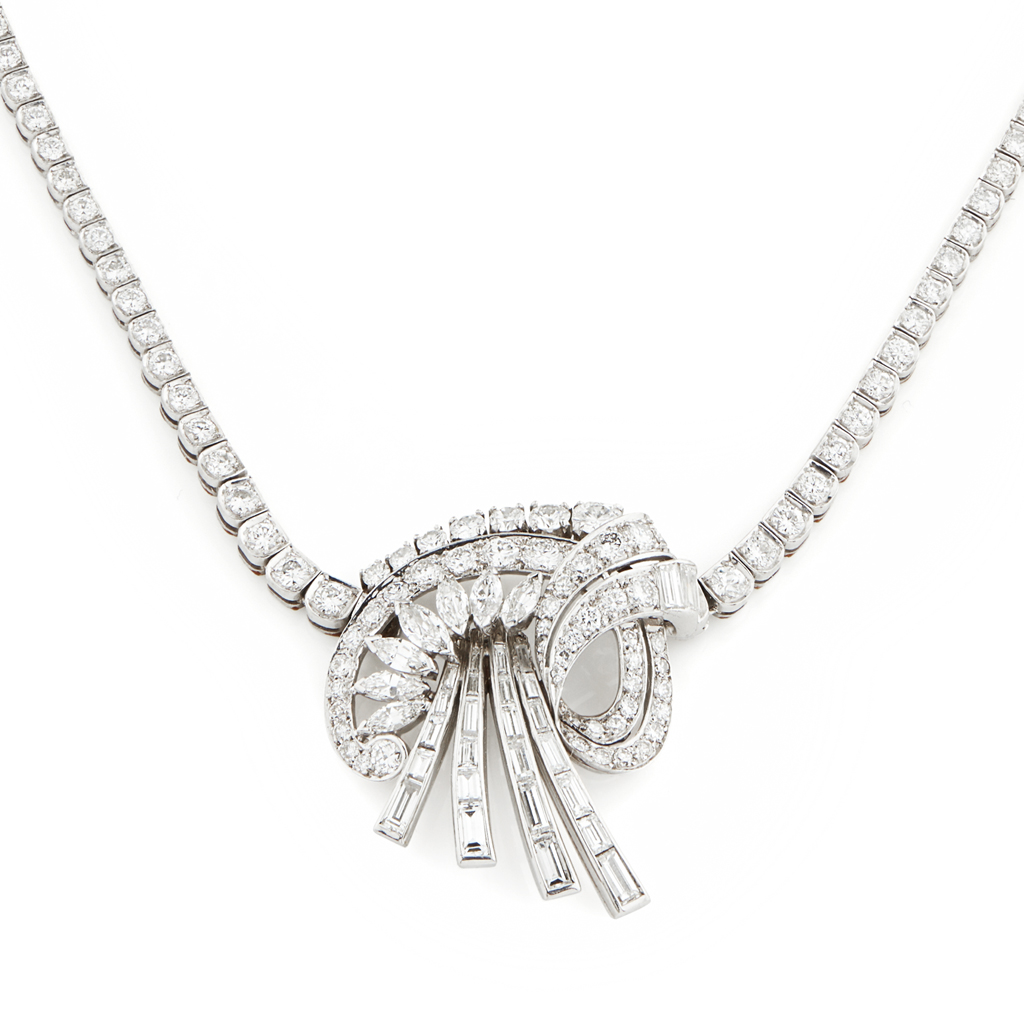 Appraisal: A s diamond set necklace S the central scrolling motif