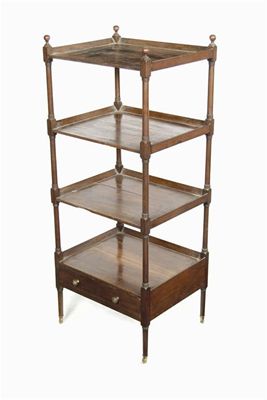 Appraisal: An early th century mahogany four tier whatnot fitted a