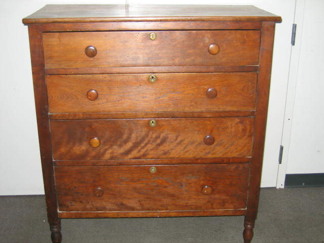 Appraisal: AMERICAN CHERRY CHEST OF DRAWERS The rectangular plank top above