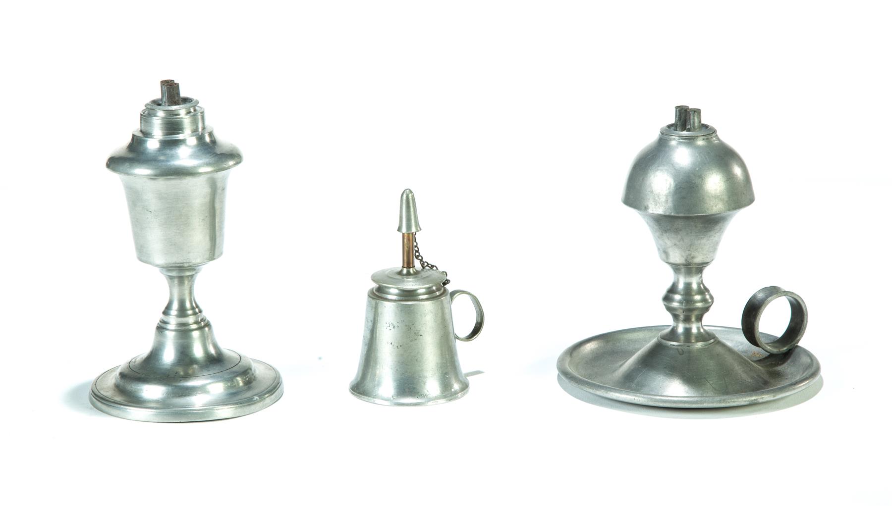 Appraisal: THREE AMERICAN PEWTER LAMPS First half- th century Two with