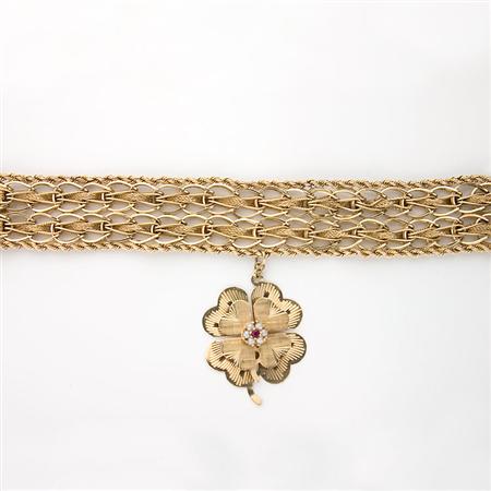 Appraisal: Gold Bracelet with Flower Charm Estimate -