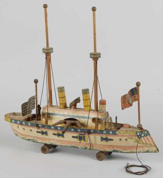 Appraisal: Early Paper on Wood Battleship Toy Description American Probably Reed