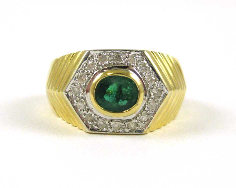 Appraisal: EMERALD DIAMOND AND FOURTEEN KARAT GOLD RING with round-cut diamonds