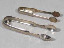 Appraisal: Two pairs of Eastern European silver sugar tongs