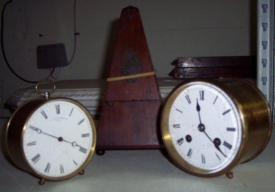 Appraisal: A metronome by Maelzel and two clocks in drum shaped