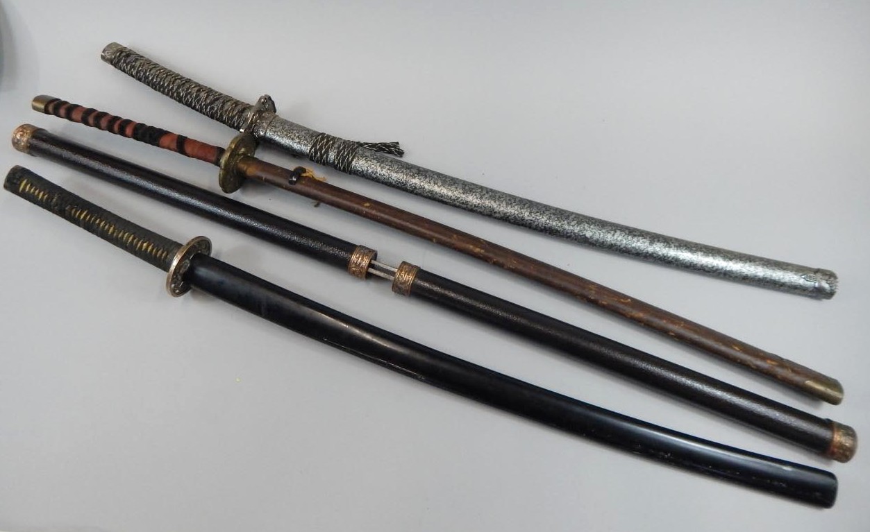 Appraisal: A collection of replica Oriental bladed weapons comprising three Ancient