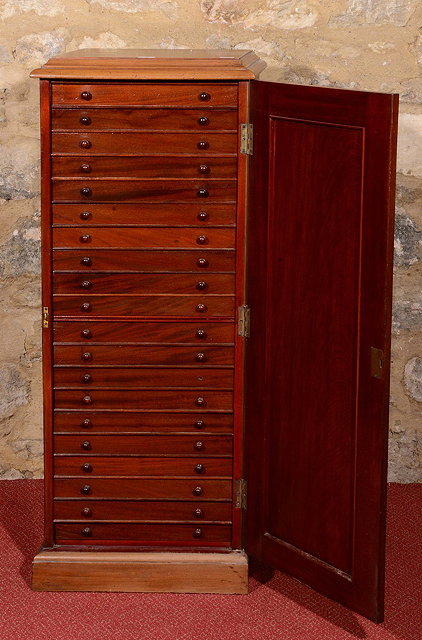 Appraisal: A VICTORIAN MAHOGANY ENTOMOLOGIST'S PEDESTAL CABINET the interior fitted twenty