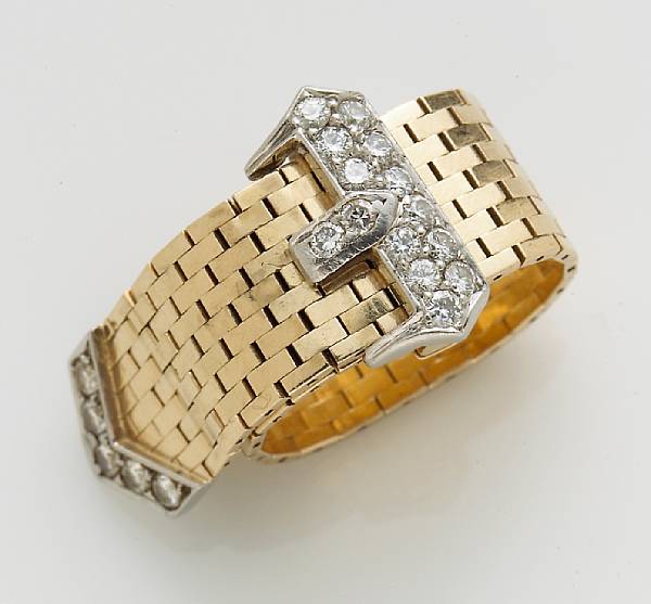 Appraisal: A retro diamond adjustable belt ring in platinum and fourteen