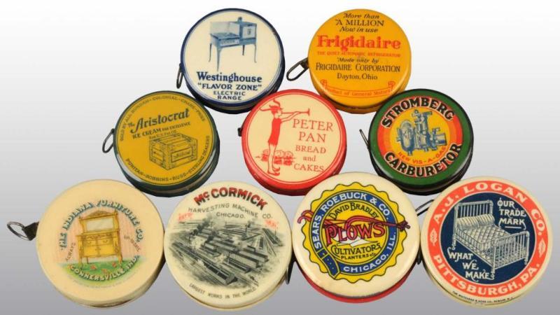 Appraisal: Lot of Celluloid Advertising Tape Measures Description Includes Indiana Furniture