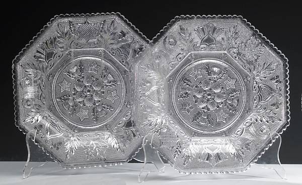 Appraisal: A set of eight molded octagonal lacey glass plates th