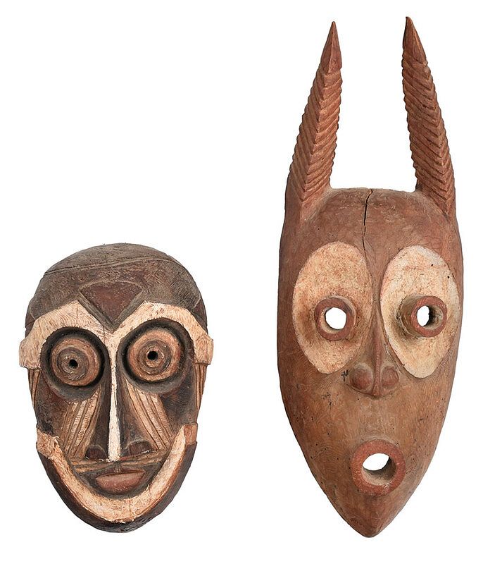 Appraisal: Two African Carved and Paint Decorated Masks th century Angola