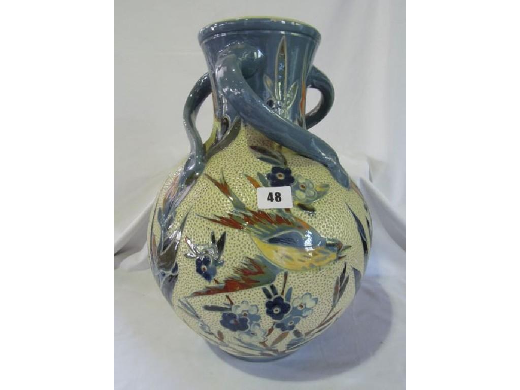 Appraisal: A large three handled Brannam Barrum vase decorated with birds