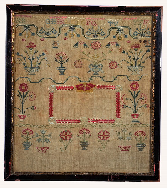 Appraisal: A TRADITIONAL CHILD'S SAMPLER apparently unfinished with alphabet and numerical