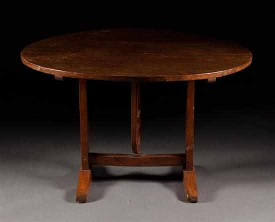 Appraisal: French Country pine tilt-top wine table th century round tilt-top