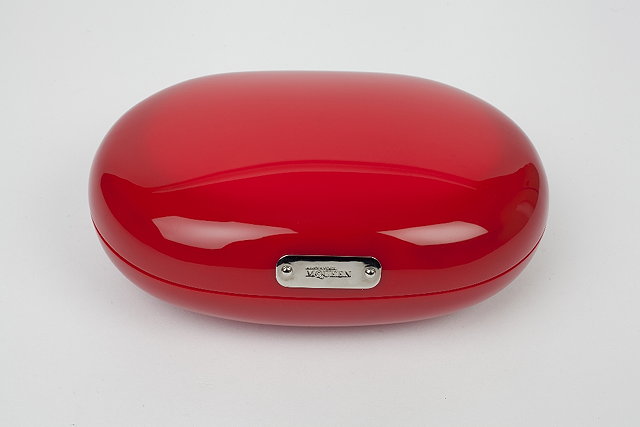 Appraisal: An Alexander McQueen high-gloss red rounded clutch bag with concealed