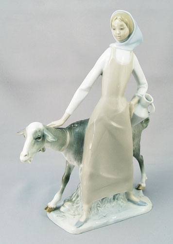 Appraisal: LLADRO PORCELAIN FIGURE ''GIRL WITH PITCHER AND GOAT'' ''h Retired